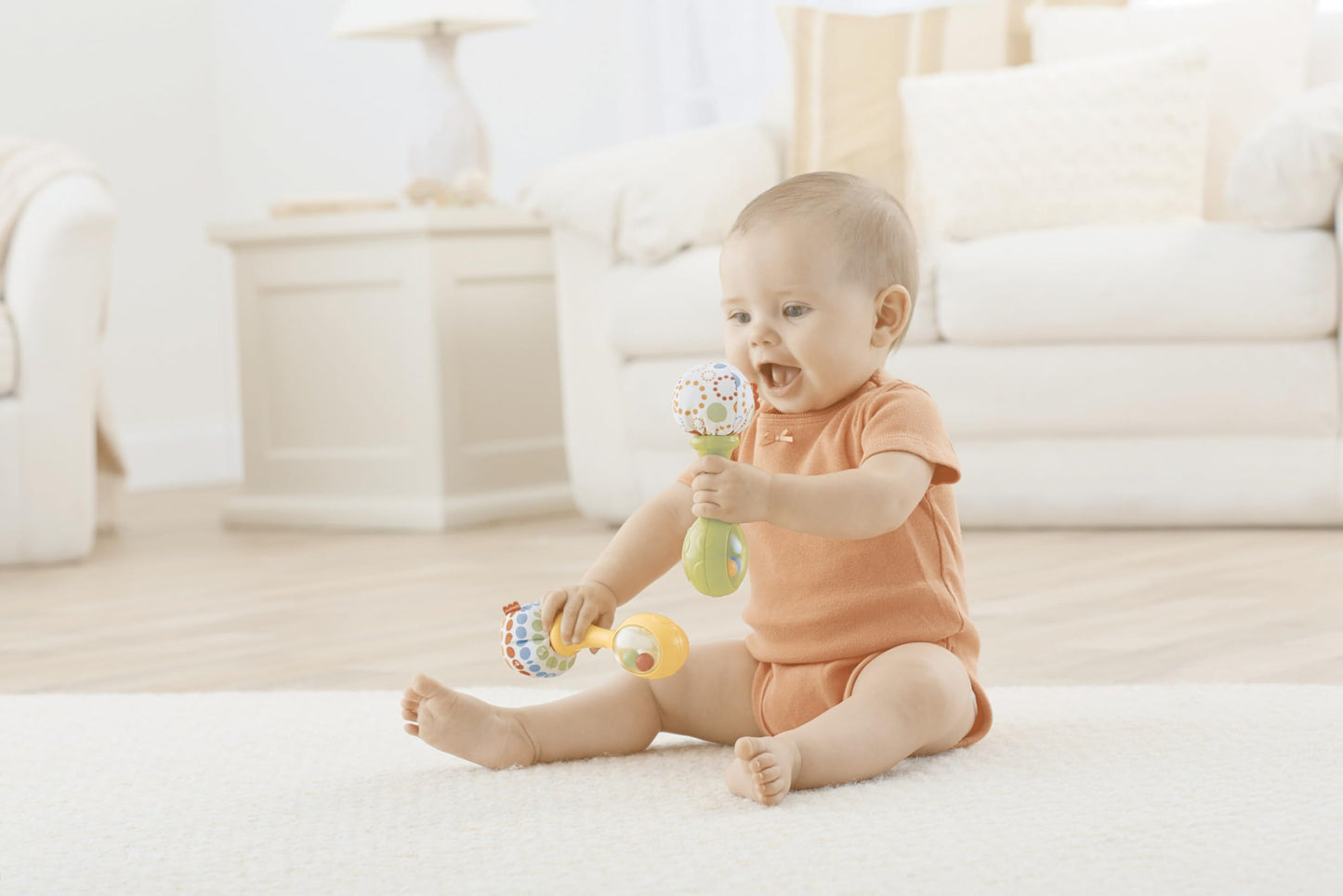 Fisher-Price Baby Newborn Toys Rattle 'n Rock Maracas, juego de 2 instrumentos musicales suaves para bebés de más de 3 meses, color azul y naranja